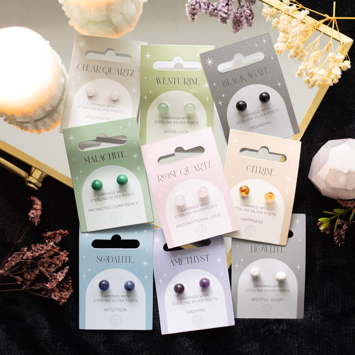 Set of 36 Semi Precious Crystal Earrings on Display