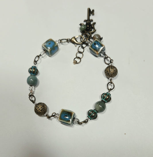 Earthy Ceramic and Antique Brass Bracelet with Key Charm