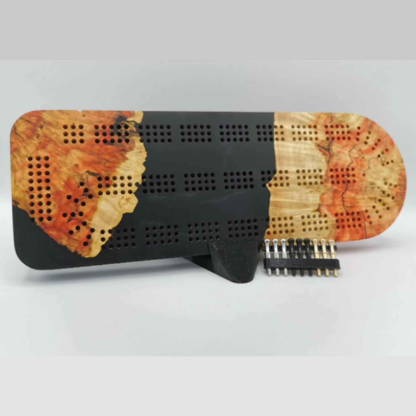Epoxy and burl cribbage board