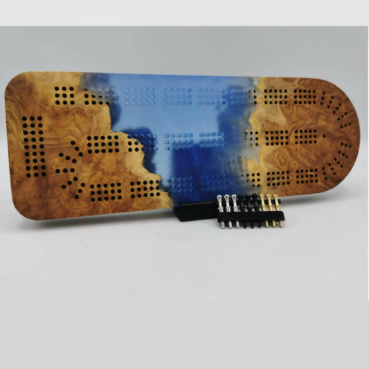 Epoxy and burl cribbage board