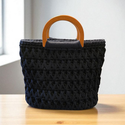 67115138a017777eba945d4c_black-purse_1757986399795.png