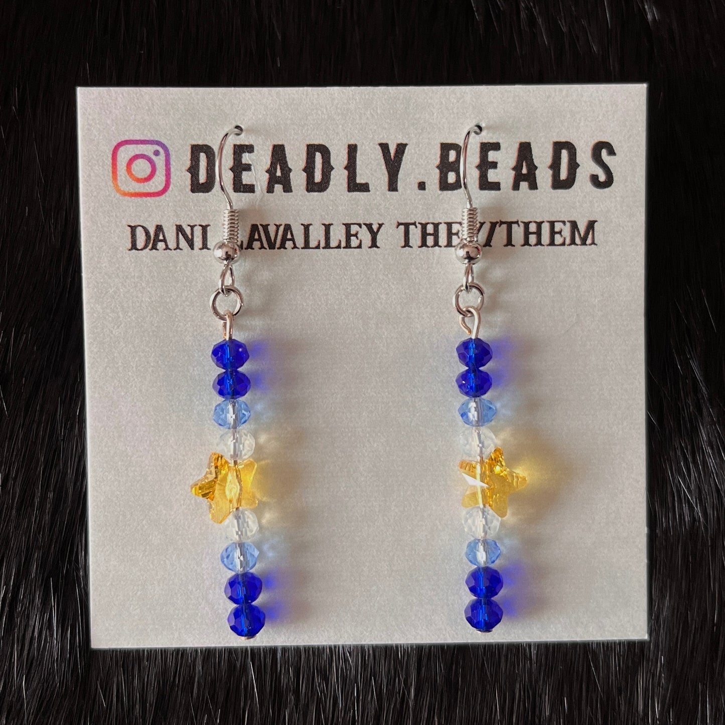 Sparkly star drop earrings