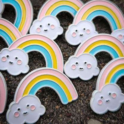 67115138a017777eba945d4c_pin-rainbow-white-1_1749653289899.jpg
