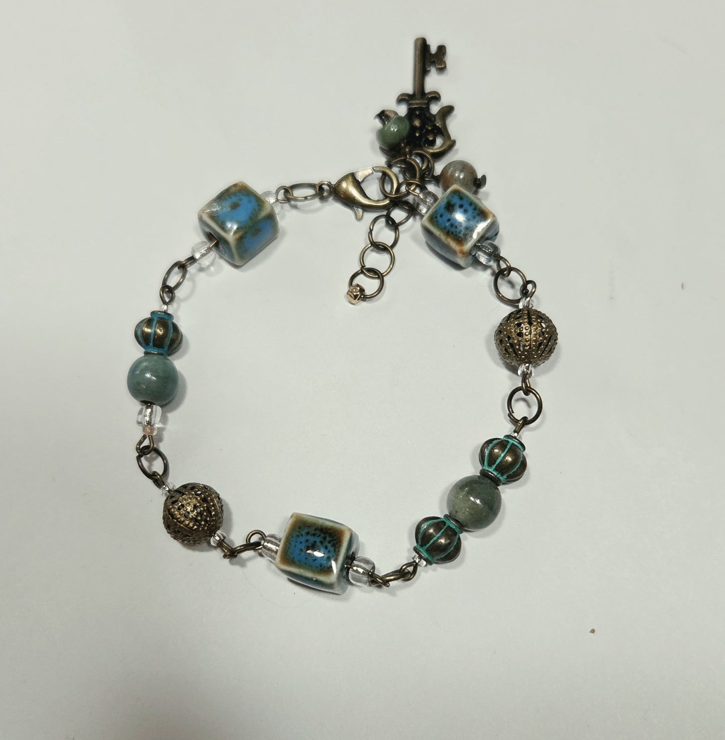 Earthy Ceramic and Antique Brass Bracelet with Key Charm