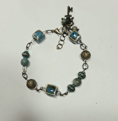 Earthy Ceramic and Antique Brass Bracelet with Key Charm