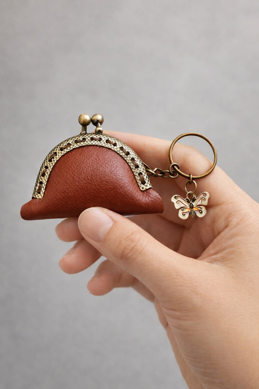 Vintage-style mini coin pouch; bag charm