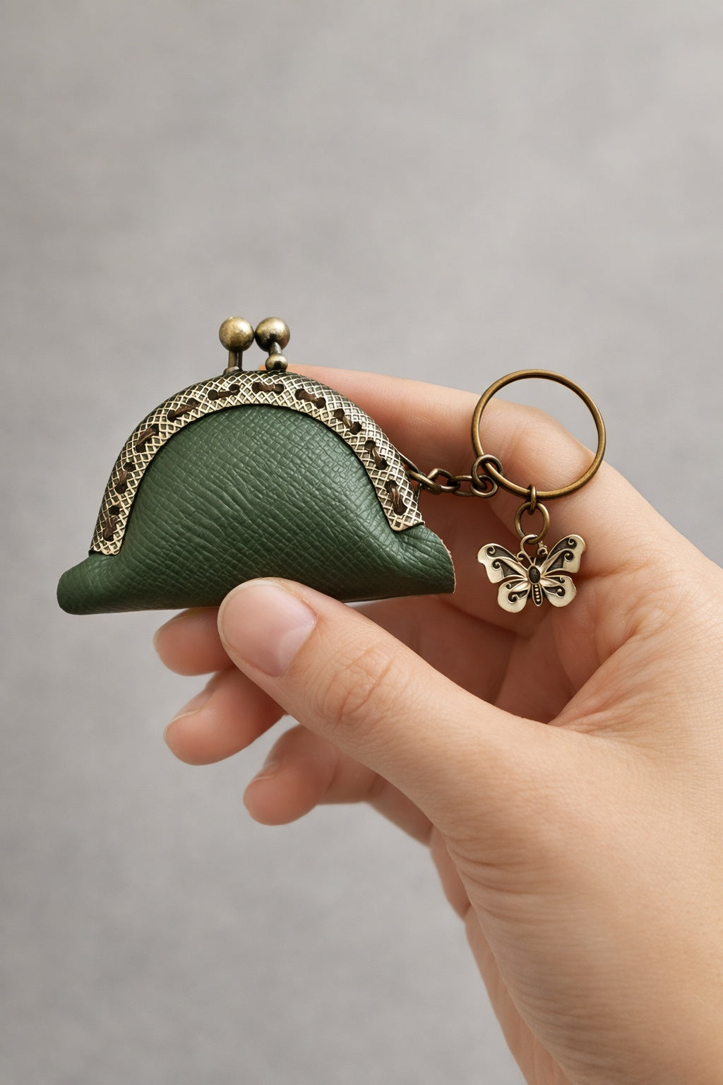 Vintage-style mini coin pouch; bag charm