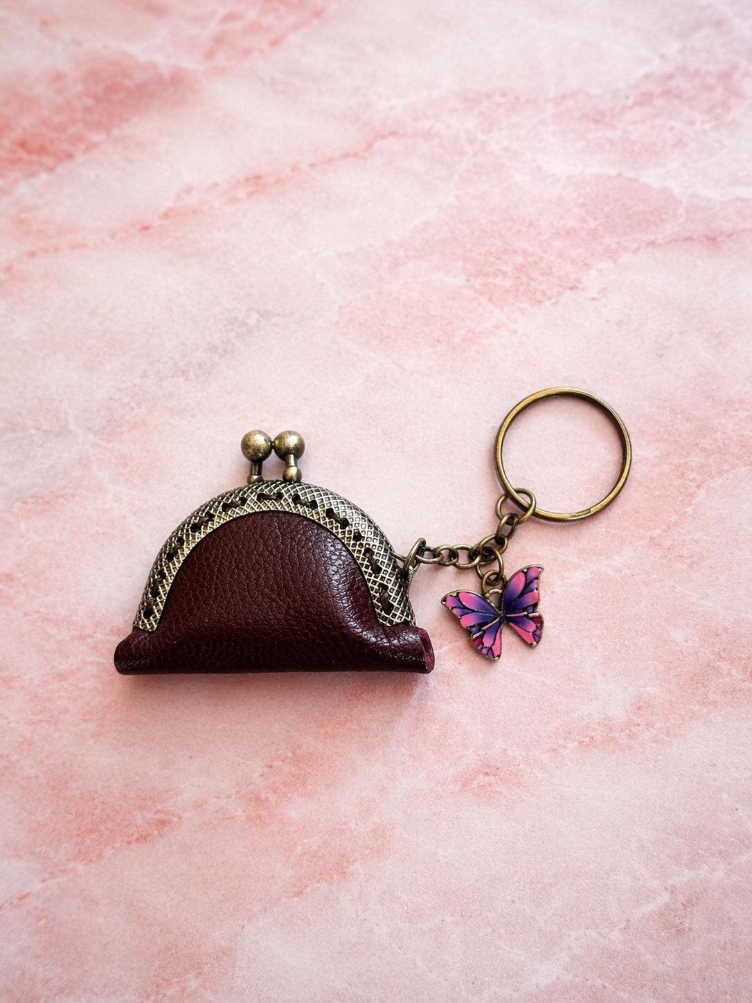 Vintage-style mini coin pouch; bag charm