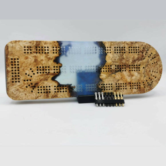 Epoxy and burl cribbage board