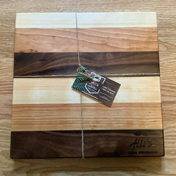 12 x 12” Cutting board (maple, cherry and walnut stripes